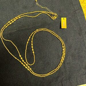 Chico’s gold tone, long necklace
